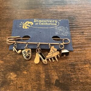 Gold Charm Brooch